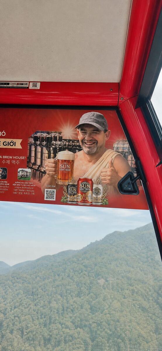 Sun Kraftbeer advert inside the Ba Na Hills cable car, brewed at 1487 metres altitude
