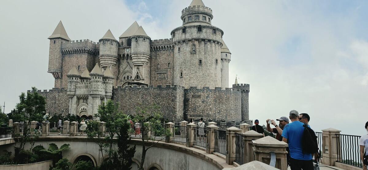 Castle at Ba Na Hills with tourists taking photos