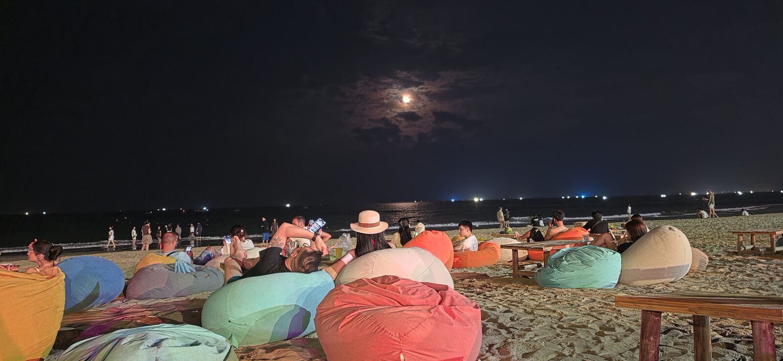 Beanbags on Da Nang Beach at night under the moon