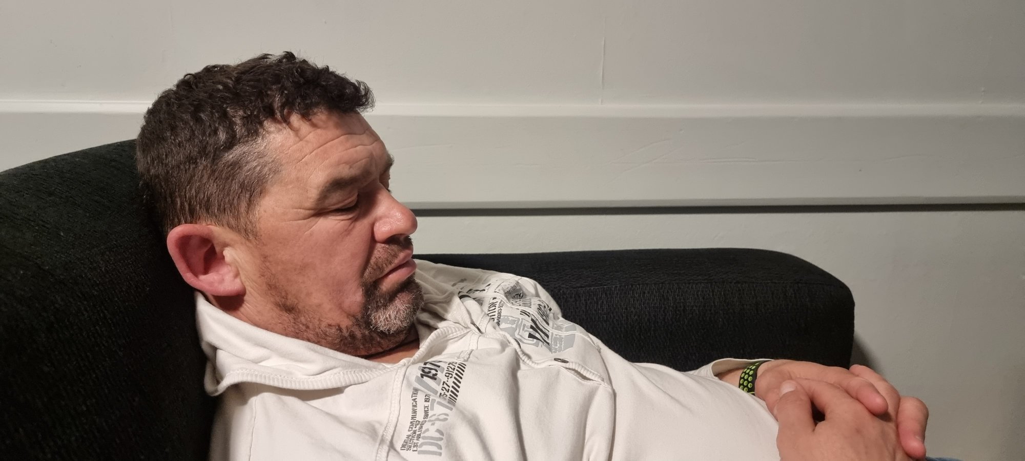 Tom asleep on the couch